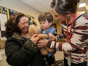 Emily Mountney-Lessard/The Intelligencer
Fifteen-month old Bryson Bradshaw gets a teddy bear as he arrives for an appointment at the Quinte Children's Treatment Centre at Belleville General Hospital on Thursday.