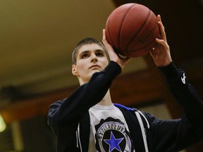 Robert Bobroczkyi shoots during an interview in Rome on Dec. 5, 2015. Standing 7-foot-6 (2.29 metres) at the age of 15, Bobroczkyi is already taller than Knicks sensation Kristaps Porzingis, or any other current NBA player. (Andrew Medichini/AP Photo)