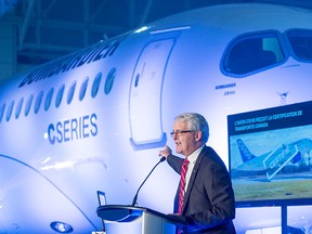 Transport Minister Marc Garneau speaks to staff at Bombardier's CS100 plant Friday, Dec. 18, 2015 in Mirabel, Que. THE CANADIAN PRESS/Ryan Remiorz