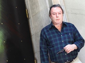 Author Christopher Hitchens poses for a portrait outside his hotel in New York in this June 7, 2010 file photo. Hitchens, 62, died of complications from esophageal cancer on Dec. 15, 2011. (REUTERS/Shannon Stapleton/Files)