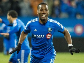 Montreal Impact's Didier Drogba celebrates after scoring against Toronto FC during first half MLS playoff action in Montreal on Oct. 29, 2015. (Graham Hughes/THE CANADIAN PRESS)