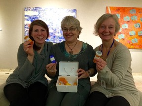 Michelle Casavant, left, Shirley Serviss and Nancy Corrigan are members of Arts on the Wards, a group that uses their artistic talents to brighten the days of hospital patients.