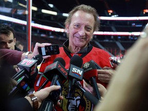 Senators owner Eugene Melnyk addresses the media during the Eugene Melnyk Skate for Kids at Canadian Tire Centre in Kanata on Friday, December 18, 2015. The Eugene Melnyk Skate for Kids attracted attracted about 100 school-aged children who all received skates, helmets and jerseys. 
MIKE CARROCCETTO /Ottawa Sun