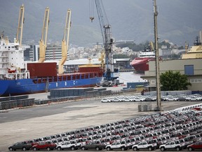 Hundreds of cars stand in the port of Rio de Janeiro, Brazil December 1, 2015.  Brazil's economy shrank 1.7 percent in the third quarter, deepening its worst recession in 25 years and starving President Dilma Rousseff's government of taxes as she struggles with a growing fiscal deficit and a vast corruption scandal. REUTERS/Ricardo Moraes