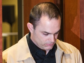 Guy Turcotte leaves the courtroom at the Saint Jerome courthouse in Saint Jerome, Que., Saturday, December 5, 2015, on the sixth day of jury deliberations in his trial. Turcotte faces charges of first degree murder in the deaths of his two children, Olivier and Anne-Sophie. THE CANADIAN PRESS/Graham Hughes