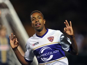 Forward Dennis Chin #15 of Orlando City celebrates after scoring a second half goal against the Philadelphia Union February 9, 2013 in the first round of the Disney Pro Soccer Classic in Orlando, Florida. The match ended in a 1-1 tie.  
Al Messerschmidt/Getty Images/AFP