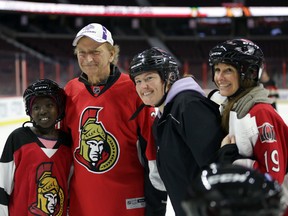 Senators owner Eugene Melnyk poses for a photo during Eugene Melnyk Skate for Kids at Canadian Tire Centre in Kanata (Ottawa), Friday, December 18, 2015. The Eugene Melnyk Skate for Kids attracted attracted about 100 school-aged children who all received skates, helmets and jerseys. 
MIKE CARROCCETTO/Ottawa Sun