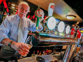 Barry Hughes, owner of the Black Bull Pub in Bolton feels he is being put out of business by the high cost of his Hydro One bills. (Dave Thomas/Toronto Sun)