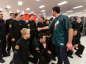 Mayor Don Iveson thanks Edmonton fire cadets for helping out during 630 CHED Santas Anonymous delivery weekend at Bonnie Doon Mall in Edmonton, Alta., on Saturday December 19, 2015. The charity, through the work of volunteers, delivers Christmas gifts to less fortunate families across the city. Ian Kucerak/Edmonton Sun/Postmedia Network
