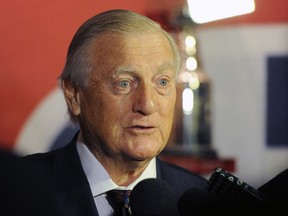 Former Montreal Canadiens great Dickie Moore speaks to the media during a ceremony for Jean Beliveau at the Bell Centre on December 7, 2014 in Montreal. (Richard Wolowicz/Getty Images/AFP)