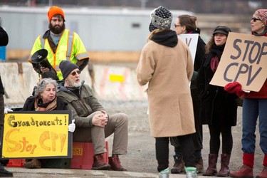 Actor James Cromwell joins protesters at a power plant that is under construction in Wawayanda, N.Y., Friday, Dec. 18, 2015. New York state police say the several protesters who were arrested blocked an entrance to the construction site at the Competitive Power Ventures power plant. (Erik Gliedman/Times Herald-Record via AP)