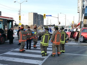 Emergency crews at the scene of a crash between a TTC bus and an SUV at Midland Ave. and Lawrence Ave. E. Sunday, Dec. 20, 2015. (Pascal Marchand photo)