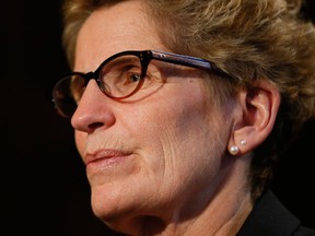 Ontario Premier Kathleen Wynne in year end interview with the Sun's Queens Park reporter Antonella Artuso,  in Toronto, Ont. on Thursday December 17, 2015. (Stan Behal/Toronto Sun/Postmedia Network)