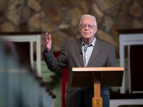 Former President Jimmy Carter teaches during Sunday School class at Maranatha Baptist Church, Sunday, Dec. 13, 2015, in Plains, Ga. (AP Photo/Branden Camp)