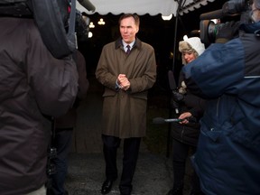 Finance Minister Bill Morneau arrives to host a dinner with provincial and territorial counterparts in Ottawa Sunday, December 20, 2015. THE CANADIAN PRESS/Fred Chartrand