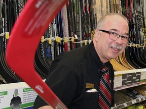 John Lappa/Sudbury Star
Canadian Tire manager Gilles Sylvestre shows off some of the sporting goods available at his Barrydowne Road store.