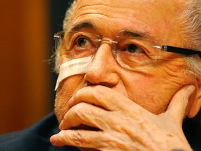 Suspended FIFA President Sepp Blatter attends a news conference in Zurich, Switzerland,  Monday, Dec. 21, 2015 after he has been banned for 8 years from all football related activities. (AP Photo/Matthias Schrader)