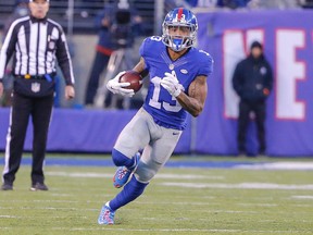 New York Giants wide receiver Odell Beckham (13) runs for long gain after pass reception during the fourth quarter against the Carolina Panthers at MetLife Stadium. Carolina Panthers defeat the New York Giants 38-35. Jim O'Connor-USA TODAY Sports