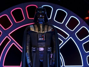 The costume of character Darth Vader from the "Star Wars" film series is displayed during press day for the exhibition "Star Wars Identities" at the "Cite du Cinema" movie studios in Saint-Denis, near Paris, France in this February 13, 2014 file photo. REUTERS/Benoit