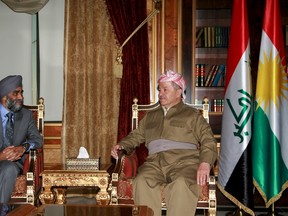 Iraq's Kurdistan region's President Massoud Barzani (R) meets with Canada's National Defence Minister Harjit Sajjan in Erbil, Iraq December 21, 2015. REUTERS/Stringer