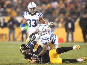 Indianapolis Colts strong safety Mike Adams tackles Pittsburgh Steelers quarterback Ben Roethlisberger. (Charles LeClaire-USA TODAY Sports)
