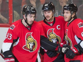 Ottawa Senators defenceman Erik Karlsson (65) celebrates with teammates after scoring a goal in the third period against the San Jose Sharks at the Canadian Tire Centre. The Senators won 4-2. (Marc DesRosiers-USA TODAY Sports)