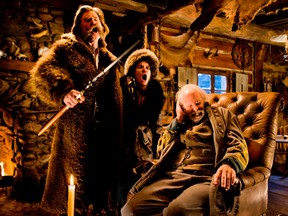 This image released by The Weinstein Company shows Kurt Russell, from left, Jennifer Jason Leigh and Bruce Dern in a scene from the film, "The Hateful Eight."  The movie opens in U.S. theaters on Jan. 1, 2016. (Andrew Cooper/The Weinstein Company via AP)