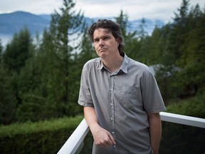 Marcus Richardson stands for a photograph outside his home in Lions Bay, B.C., on Friday Dec. 18, 2015. THE CANADIAN PRESS/Darryl Dyck