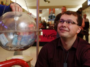 LUKE HENDRY/THE INTELLIGENCER
Salvation Army volunteer Jeff Cross smiles as a shopper drops coins into the collection kettle at the Quinte Mall in Belleville. The campaign ends Thursday. It funds food, clothing and other programs but is $30,000 shy of its goal.