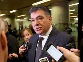Ontario Finance Minister Charles Sousa talks to reporters at the conclusion of a meeting with Federal Finance Minister Bill Morneau and his provincial and territorial counterparts in Ottawa, Monday, December 21, 2015. (THE CANADIAN PRESS/Fred Chartrand)