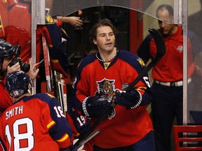 Florida Panthers right winger Jaromir Jagr carries his sticks as right winger Reilly Smith looks on before a game against the Ottawa Senators at BB&T Center on Dec. 22, 2015. (Robert Mayer/USA TODAY Sports)