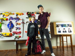 Sarnia filmmaker Aaron Esser is pictured here with actor Mitchell Guerette, 10, during the filming of "Elite Nerf Strike." The 22-year-old filmmaker will be staging a premiere of his two new YouTube films on Jan. 1 at River City Community Centre. Handout/Sarnia Observer/Postmedia Network