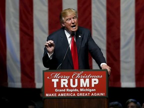U.S. Republican presidential candidate Donald Trump addresses the crowd during a campaign rally in Grand Rapids, Michigan, December 21, 2015. (REUTERS/Rebecca Cook)