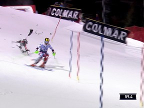 In this image taken from video a camera drone crashes, narrowly missing Austria’s Marcel Hirscher, during a World Cup men’s slalom race in Madonna Di Campiglio, Italy, Tuesday, Dec. 22, 2015. (Infront Sport via AP)