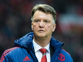 Manchester United manager Louis van Gaal watches his team’s English Premier League match against Norwich City at Old Trafford Stadium in Manchester Saturday, Dec. 19, 2015. (AP Photo/Jon Super)