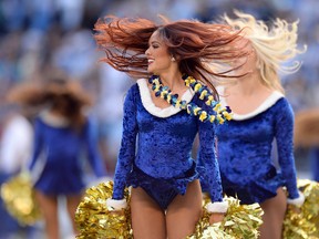 The San Diego Charger Girls perform during the fourth quarter against the Miami Dolphins at Qualcomm Stadium. (Jake Roth-USA TODAY Sports)