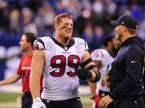 Houston Texans defensive end J.J. Watt celebrates an interception in the second half against the Indianapolis Colts at Lucas Oil Stadium. (Thomas J. Russo-USA TODAY Sports)