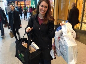 Erin Walker found Christmas Eve at the Eaton Centre to be less busy than recent days. (MARYAM SHAH/Toronto Sun)