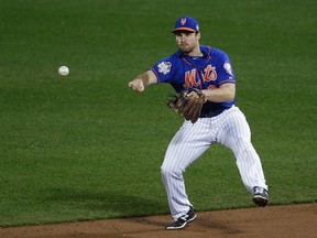 Second baseman Daniel Murphy is signing a three-year contract with the Nationals. (Julie Jacobson/AP Photo)