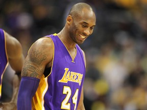 Retiring Lakers forward Kobe Bryant is leading the 2016 NBA all-star vote as of Christmas Day. (Chris Humphreys/USA TODAY Sports)