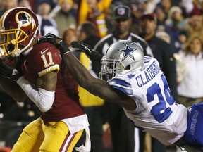 Washington Redskins wide receiver DeSean Jackson scores a touchdown against Dallas Cowboys cornerback Morris Claiborne at FedExField on December 7, 2015 in Landover, Maryland. (Rob Carr/Getty Images/AFP)