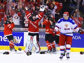 Canada celebrates the win over Russia during the gold medal game at the 2015 World Junior Hockey Championship in Toronto on Jan. 5, 2015. Toronto sports fans will have a lot of event to choose from over the next 13 months, with the NBA all-star game, Blue Jays season, World Cup of Hockey, Grey Cup, world junior hockey and the NHL's Winter Classic on tap. (Dave Abel/Toronto Sun/Files)