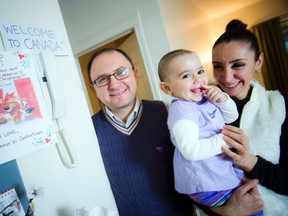 Hovig Mirakian his wife Maral, their baby Patil spoke with the Ottawa Sun  about their journey from Syria to Canada. Ashley Fraser / Ottawa Sun / Postmedia Network