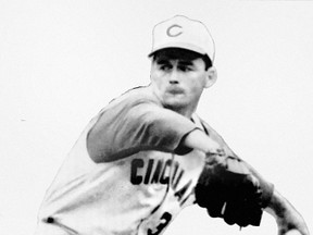 Circa 1963 action shot photograph of American baseball pitcher James Jerome O'Toole wearing a Cincinnati Reds uniform. (WIKIMEDIA COMMONS)
