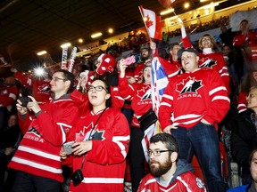 Supporters of team Canada cheer during the 2016 IIHF World Junior Ice Hockey Championship match between USA and Canada in Helsinki, Finland, December 26, 2015. REUTERS/Roni Rekomaa/Lehtikuva