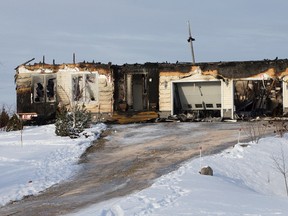 A fire damaged home near 50322 - Range Road 232 (south east of Beaumont, Albert), in Edmonton Alta. on Sunday Dec. 27, 2015. The home was destroyed by a Dec. 26, 2015 fire. David Bloom/Edmonton Sun/Postmedia Network