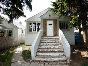 A home at 11234 - 86 St., owned by a convicted mortgage fraudster  Abdullah Shah, in Edmonton Alta. on Thursday Aug. 6, 2015. David Bloom/Edmonton Sun/Postmedia Network