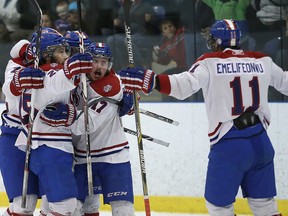 The Kingston Voyageurs, celebrating a goal during a second-round playoff series game, enjoyed a long postseason ride that took them to Game 7 of the Ontario Junior Hockey League championship series. (Ian MacAlpine/The Whig-Standard)