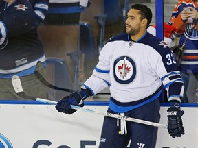 Dustin Byfuglien left practice early on Monday, but is back in the lineup Friday. (Perry Nelson-USA TODAY Sports file photo)