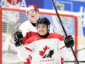 Canada's John Quenneville celebrates his second period goal against Denmark during preliminary hockey action at the IIHF World Junior Championship, in Helsinki, Finland, on Monday, Dec. 28, 2015. THE CANADIAN PRESS/Sean Kilpatrick